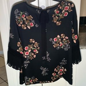 Black floral dress shirt with tie in back. Size M.